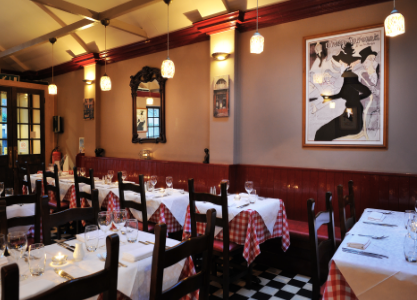 This restaurant has it all. Checked tablecloths with matching floor, mirrors with funky frames, a slightly snotty manager and Coq au Vin on the menu. None of this fusion, modern,...